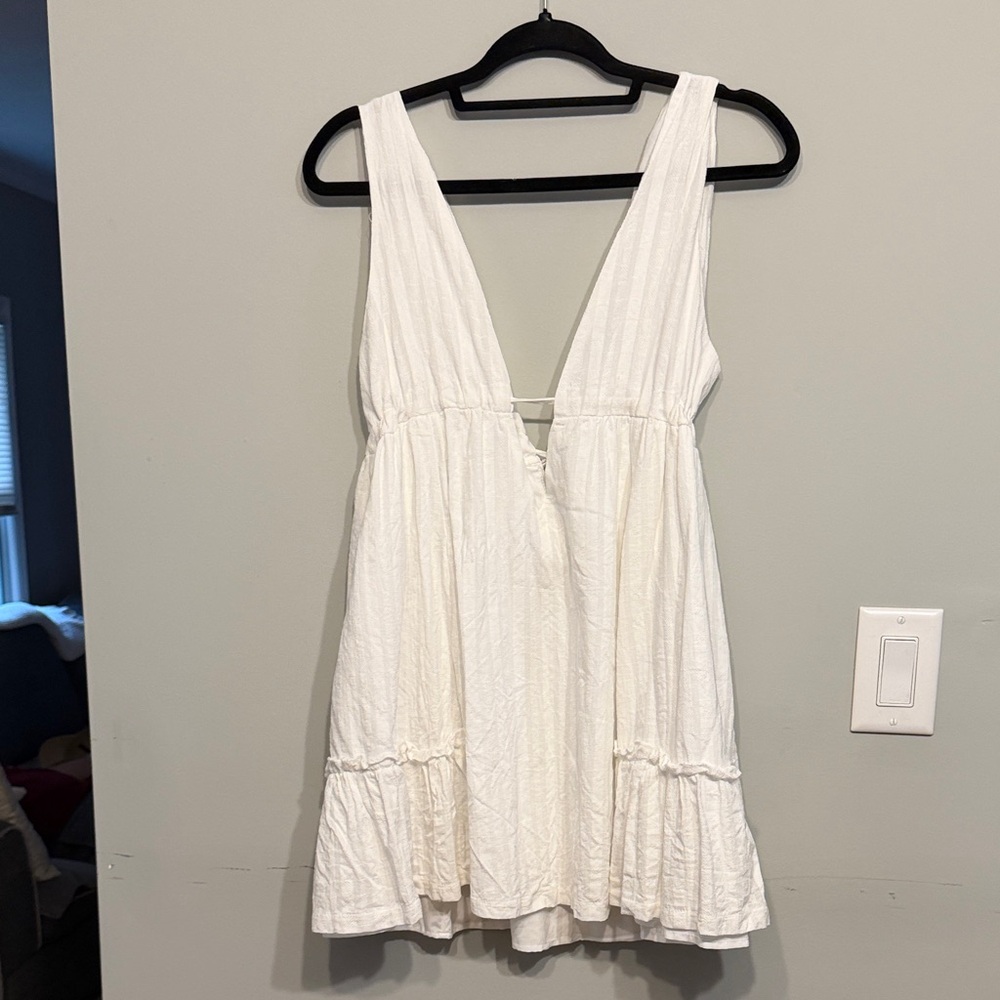 White Ruffled Sleeveless Blouse